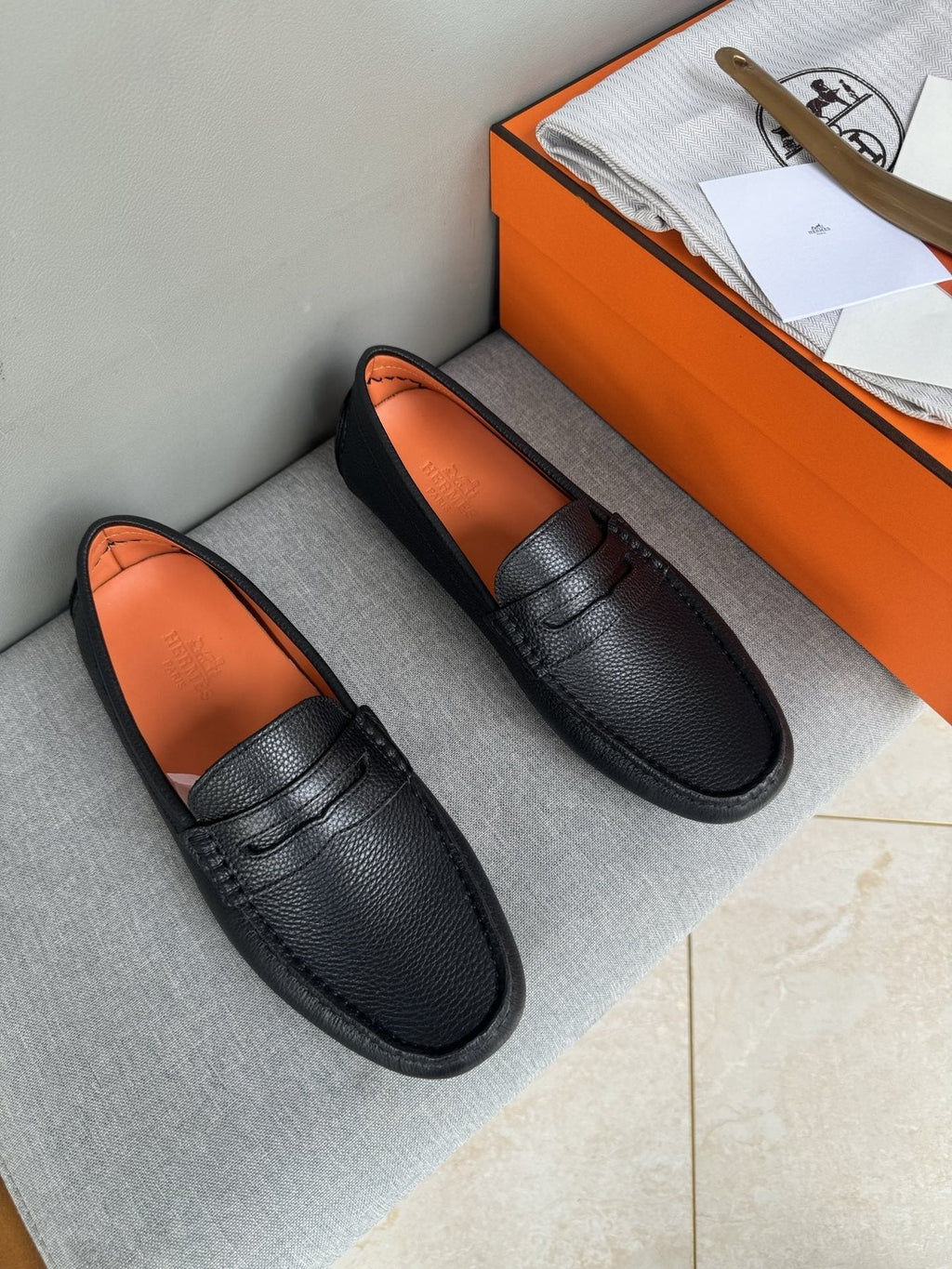 Hermès Black Textured Penny Loafers — front