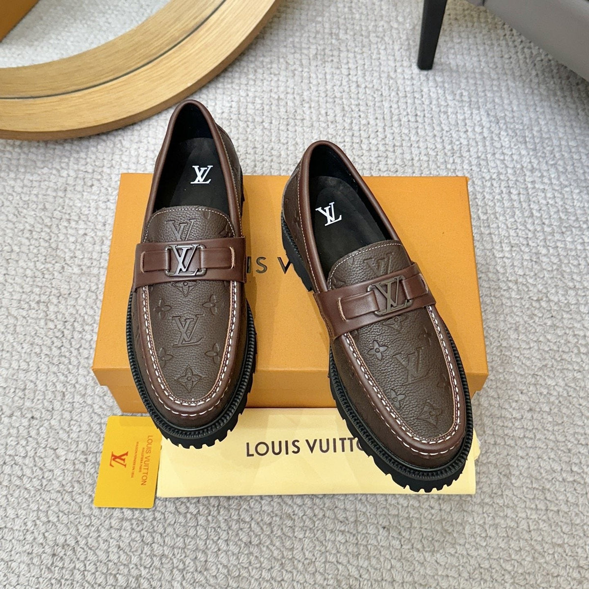 Louis Vuitton Embossed Lug Sole Loafers — front