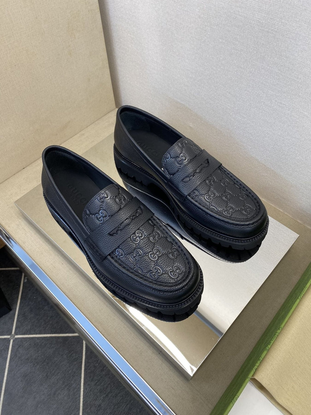 Gucci Black Embossed Lug Sole Loafers — front