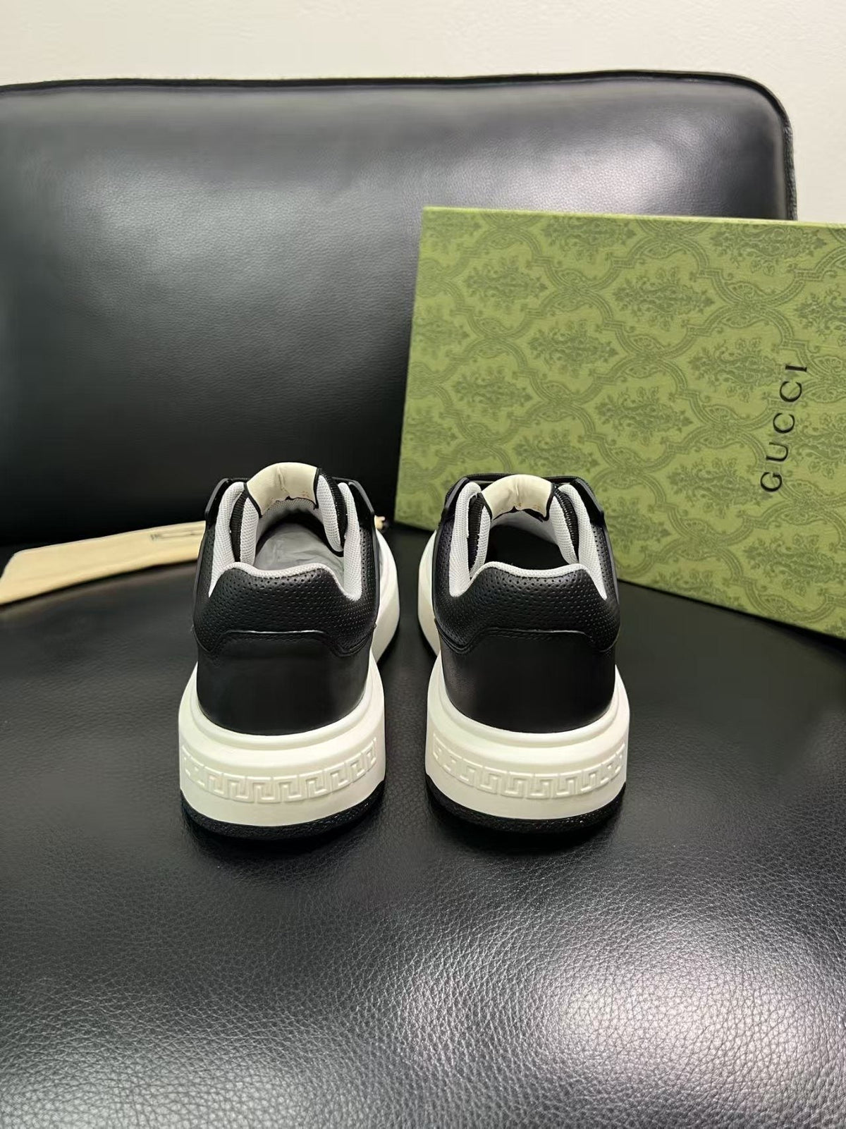 Gucci Embossed Low-Top Sneakers — back