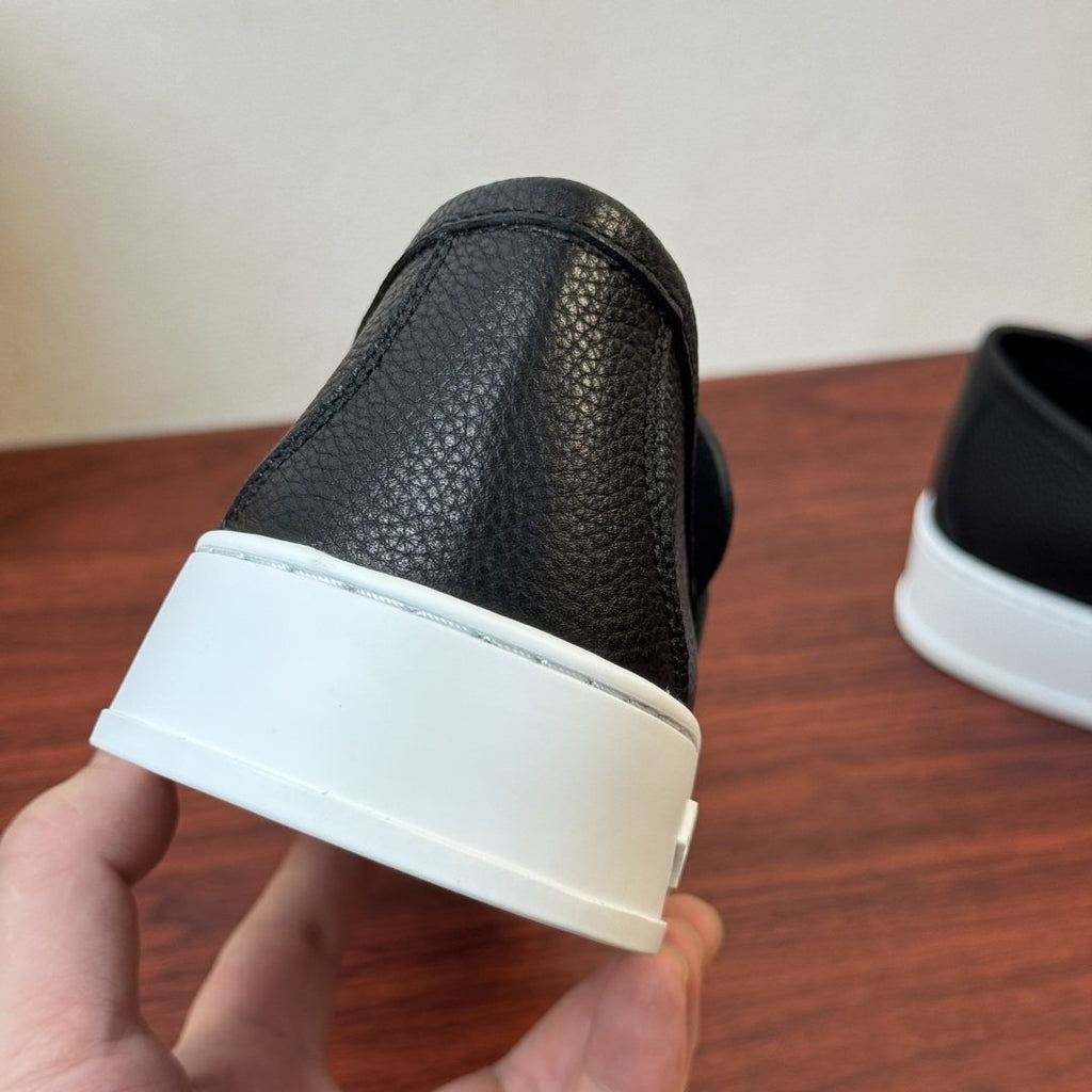 Louis Vuitton Textured Slip-On Loafers — back