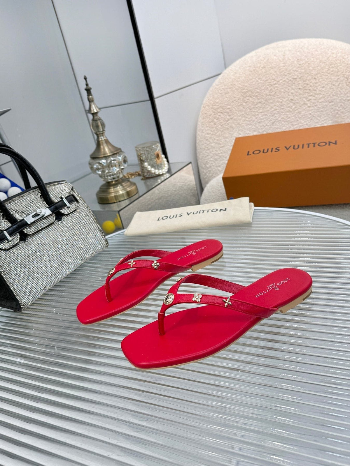 Louis Vuitton Metal-Detail Thong Sandals — front