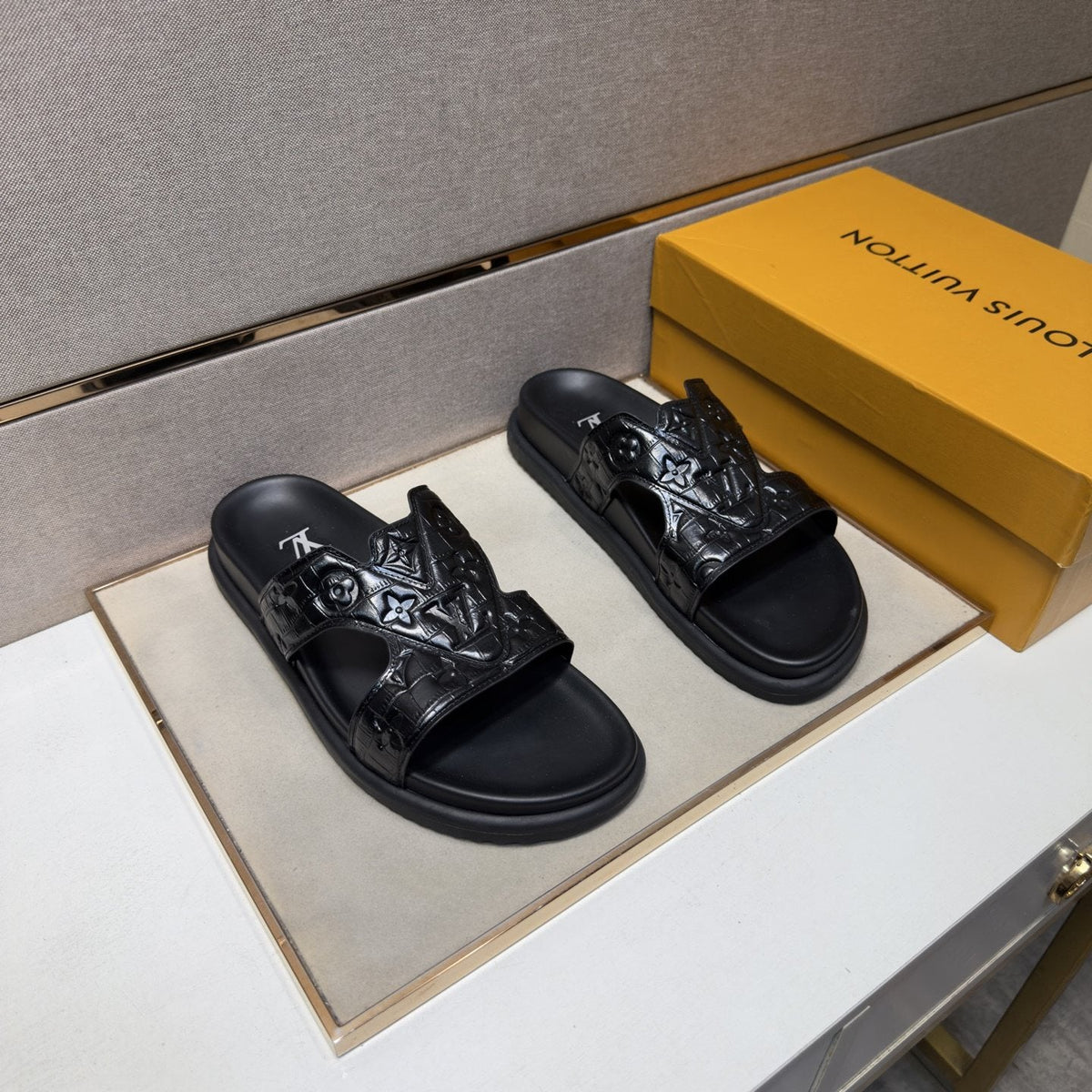 Louis Vuitton Textured Monogram Slide Sandals — front